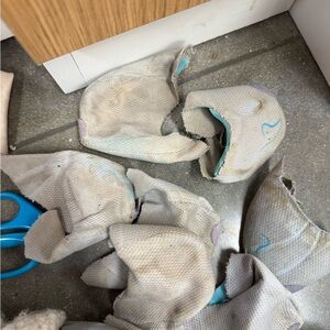 Bundle of (9) used toe pads and one pair of flat shoes